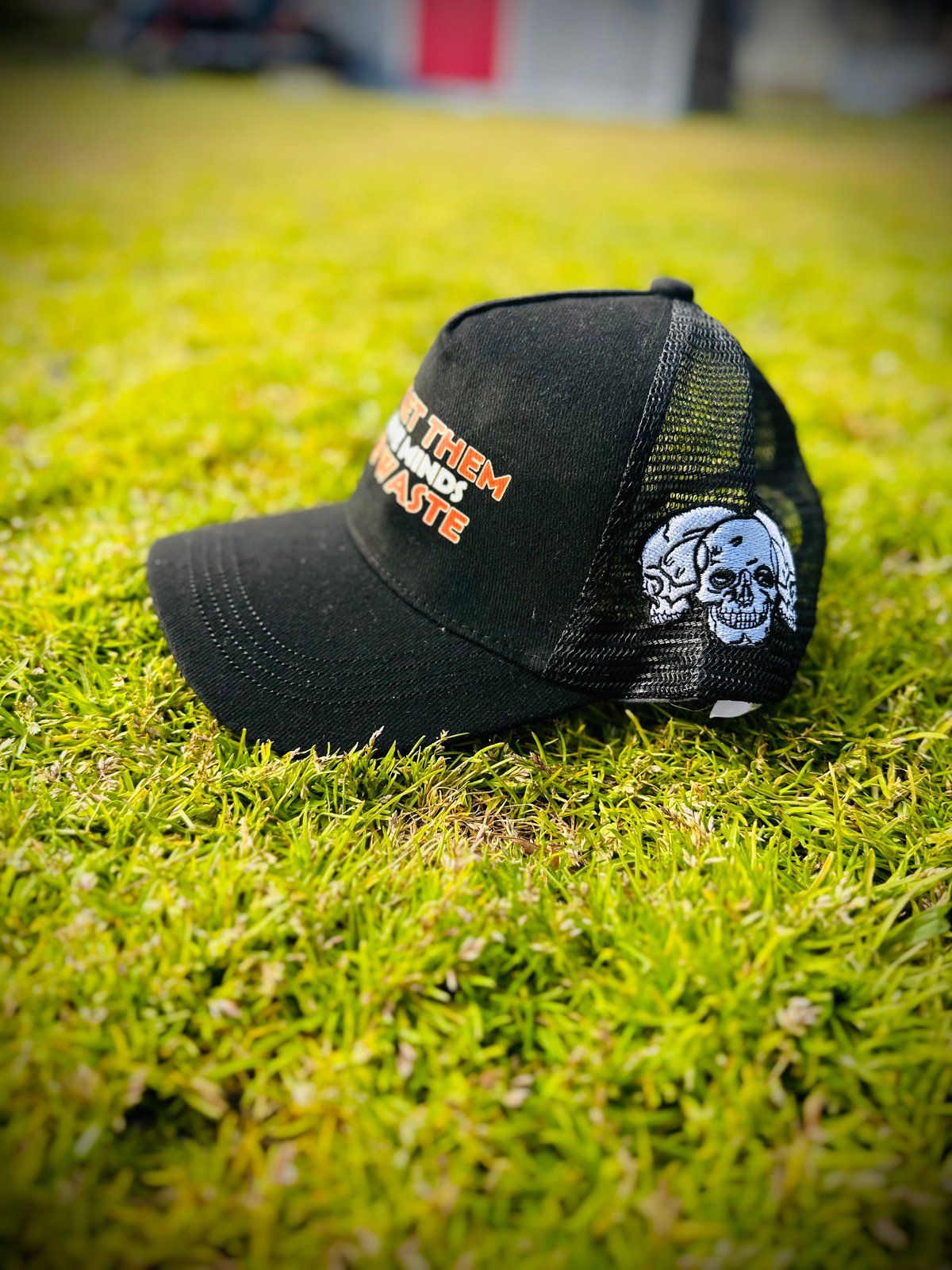 Black with Orange“Calamity Collection” Trucker Hat